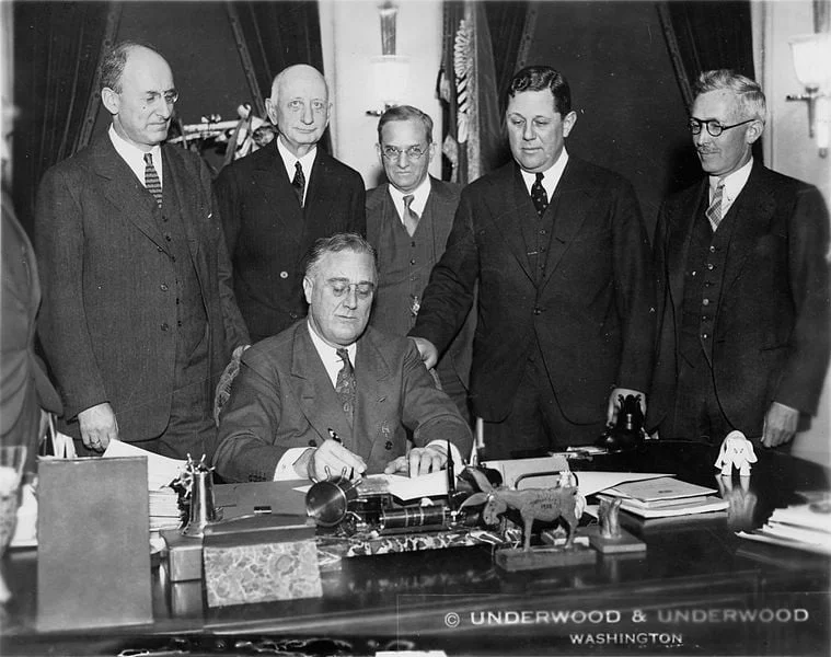 President Franklin D. Roosevelt signs the Gold Bill on January 30,1934