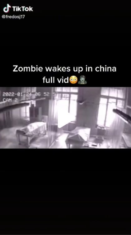 Klip z TikToka z napisem "Zombie budzi się w Chinach, całe wideo"